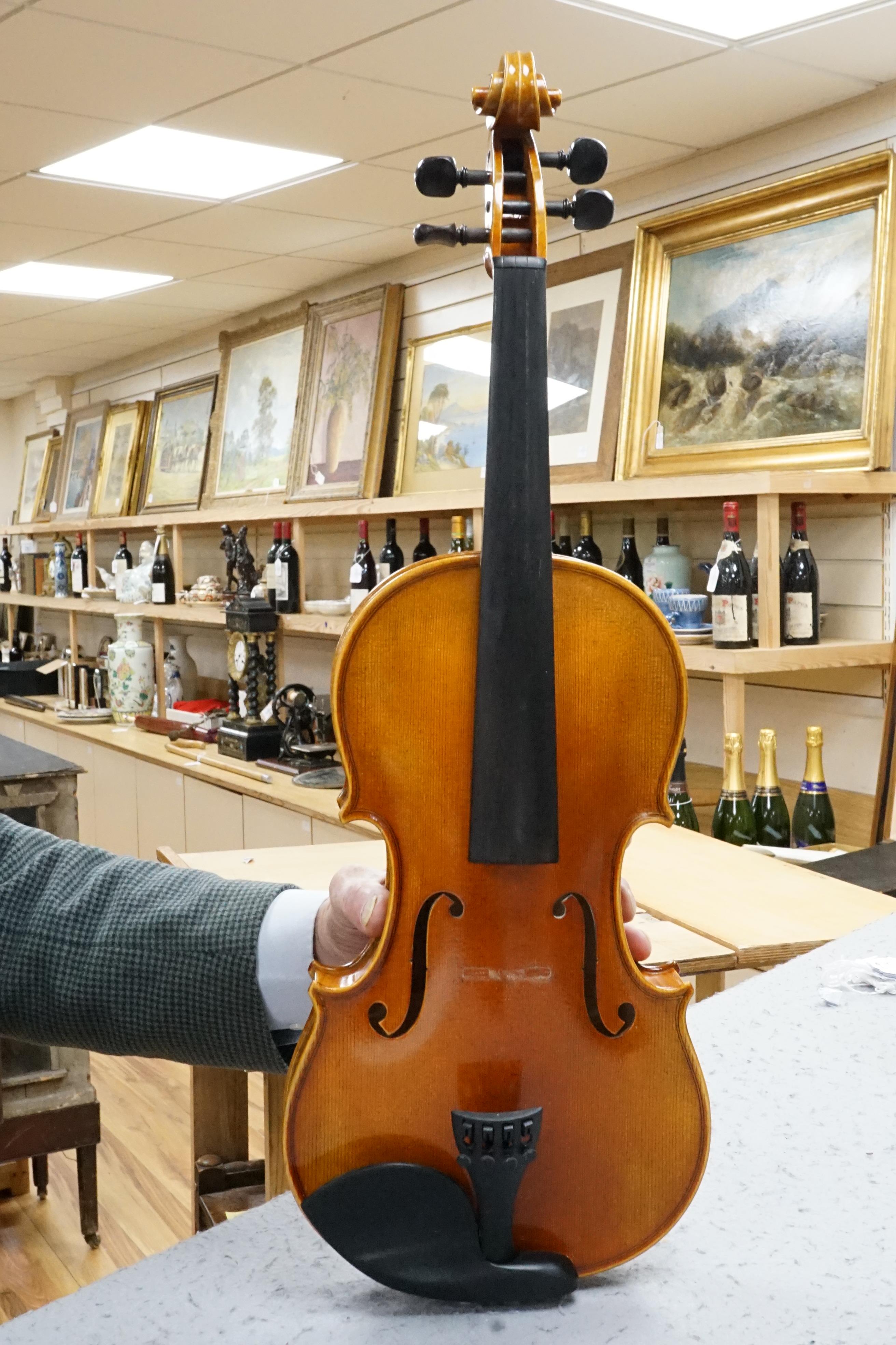 A cased German violin